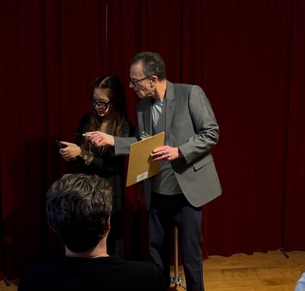 Mark Thomas performing live on stage